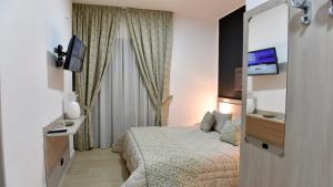 Posteľ alebo postele v izbe v ubytovaní Bed And Breakfast Garibaldi54