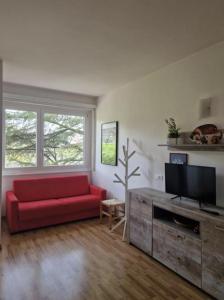 Televiisor ja/või meelelahutuskeskus majutusasutuses appartamento Garda Nova