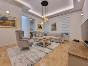 Posezení v ubytování Apartment in Velika Aleja at Ilidža