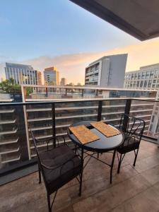 En balkon eller terrasse på Apartamento Luxo VOlimpia