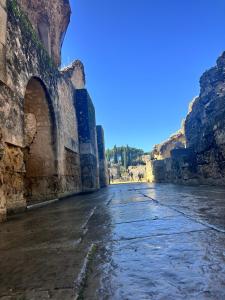 an empty street in the ruins of a building at Pisito de la Lola Flores 2 in Santiponce