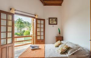 Postel nebo postele na pokoji v ubytování Pousada Conchas de Paraty
