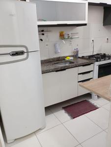 Kuchyň nebo kuchyňský kout v ubytování Apartamento bem centralizado e aconchegante em Aracaju