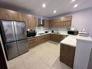 Η κουζίνα ή μικρή κουζίνα στο Charming Intimate Villa