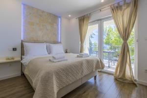 Posteľ alebo postele v izbe v ubytovaní PALACE PAULINA C + 37 fotografií
