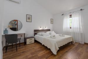 Posteľ alebo postele v izbe v ubytovaní Villa Vital + 31 fotografií