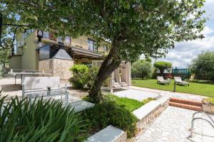Vonkajšia záhrada v ubytovaní Villa Vital
