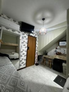 Postel nebo postele na pokoji v ubytování Loft Morada do Porto