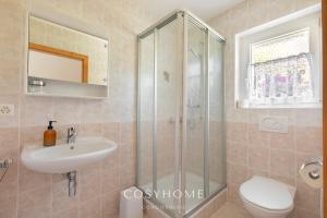 A bathroom at Chalet des Alpes - Sunset View - Crans-Montana
