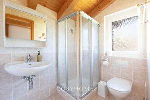 A bathroom at Chalet des Alpes - Sunset View - Crans-Montana