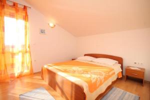 Posteľ alebo postele v izbe v ubytovaní Apartments Sea view