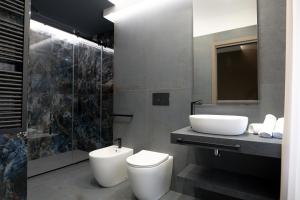 Koupelna v ubytování G-Rooms