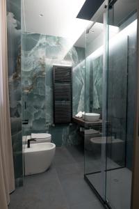 Koupelna v ubytování G-Rooms