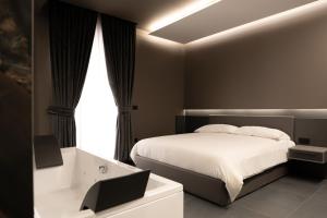 Postel nebo postele na pokoji v ubytování G-Rooms