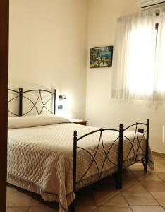 Postel nebo postele na pokoji v ubytování Agriturismo da Regina