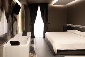 Postel nebo postele na pokoji v ubytování G-Rooms