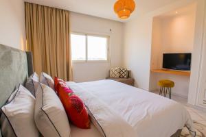 Ένα ή περισσότερα κρεβάτια σε δωμάτιο στο Résidence Borj Dlalate - Luxe - 3 ch