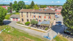 an overhead view of a large house with a parking lot at Le Hamburg - Les appartements de l'olivier in Loyettes +6 photos