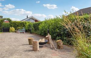 A garden outside Awesome Home In Haderslev With Kitchen
