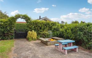 A garden outside Awesome Home In Haderslev With Kitchen