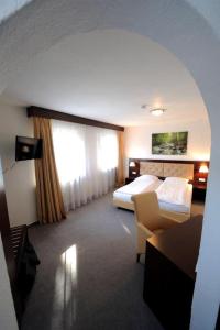 Ένα ή περισσότερα κρεβάτια σε δωμάτιο στο Hotel zur Post