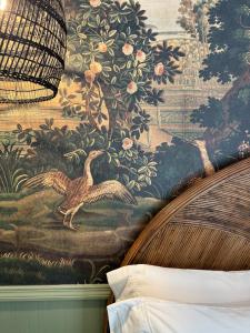Postel nebo postele na pokoji v ubytování Swank Boutique Suites