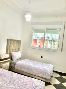 Postel nebo postele na pokoji v ubytování High quality appartement (4éme étage)