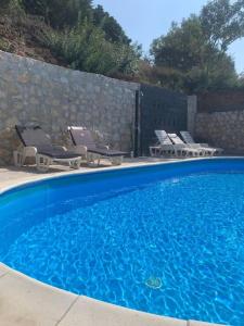 Swimmingpoolen hos eller tæt på Grey Beach Apartment