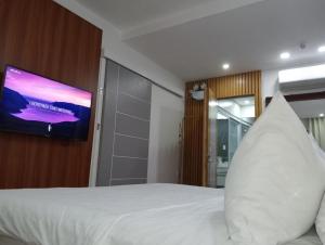 TV a/nebo společenská místnost v ubytování Balay Guti-ay + 18 fotografií