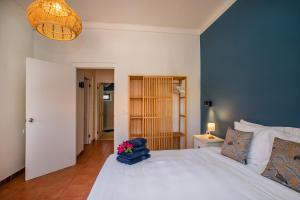 Ένα ή περισσότερα κρεβάτια σε δωμάτιο στο Bloublou Apartments Curaçao