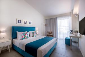 Posteľ alebo postele v izbe v ubytovaní Aloe Boutique Hotel & Suites - adults only + 37 fotografií