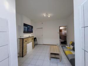 Sjónvarps- og/eða afþreyingartæki á 2 Chambre disponible