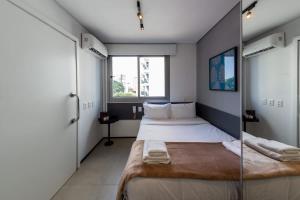 Una cama o camas en una habitación de BHomy Vergueiro 11 fotos más