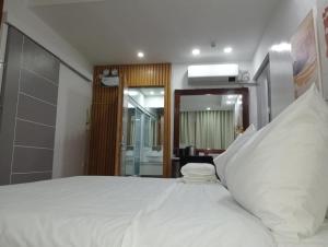 Postel nebo postele na pokoji v ubytování Balay Guti-ay