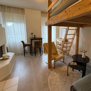 Posezení v ubytování Petit Canada - Studio à louer + 10 fotografií