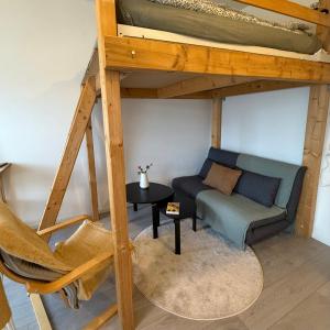 Posezení v ubytování Petit Canada - Studio à louer