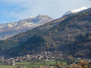 a small town in the middle of a mountain at Studio in Aime-La Plagne