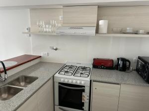 Køkken eller tekøkken på ESPACIO ESTOMBA 666 Elegante estudio con cochera