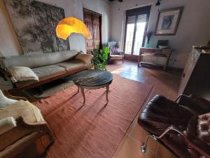 Posezení v ubytování Dúplex independiente con acceso a patio y piscina La nueva Candeleda