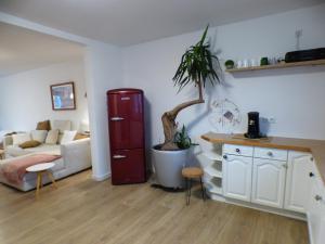 Posezení v ubytování Ferienwohnung im Grünen + 2 fotografie