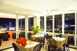 A restaurant or other place to eat at D&C Hotel