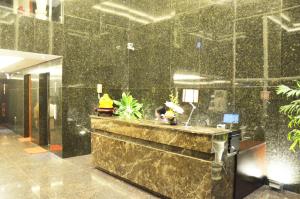 The lobby or reception area at D&C Hotel