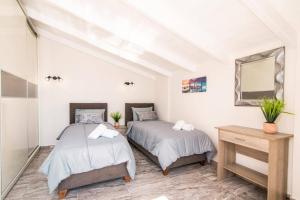 Posteľ alebo postele v izbe v ubytovaní Villa Poseidon Seaside by Villa Plus