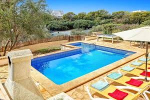 The swimming pool at or close to Villa Cala Nit by Villa Plus