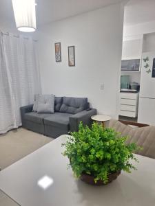 Posezení v ubytování Apartamento com suíte