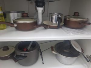 Kuchyň nebo kuchyňský kout v ubytování Apartamento com suíte