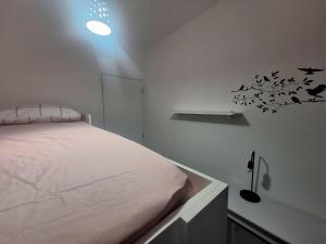 Postel nebo postele na pokoji v ubytování Apartamento com suíte
