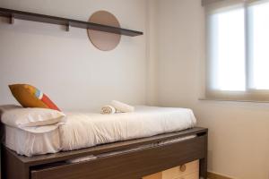 Posteľ alebo postele v izbe v ubytovaní Myflats Deluxe Balcon de Arenales
