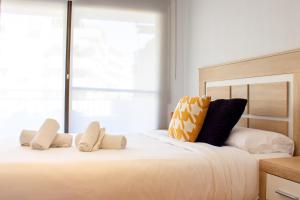 Posteľ alebo postele v izbe v ubytovaní Myflats Deluxe Balcon de Arenales
