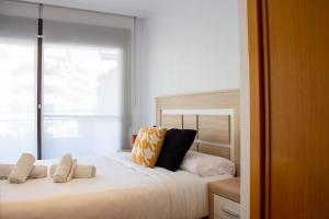 Posteľ alebo postele v izbe v ubytovaní Myflats Deluxe Balcon de Arenales